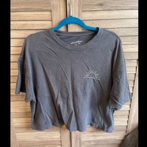 Black cropped shirt with embroidered sun detail